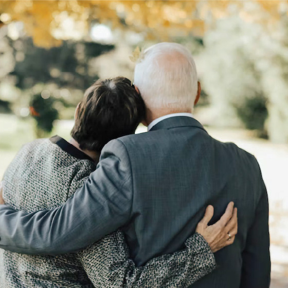 Elderly Couple Embracing